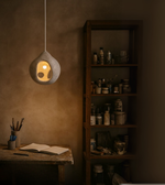Sculpted tranquility pendant light by Daya Worldwide highlighting an elegant, modern design with intricate sculptural details.