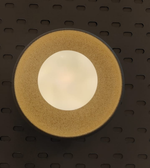 Decorative wall light with textured gold finish and round glass diffuser