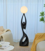 Modern feminine sculpture floor lamp by Daya Worldwide, featuring a sleek, artistic statue design for stylish home lighting.