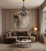 Royal Opulence chandelier with black wrought iron and crystals hanging in a luxury living room.