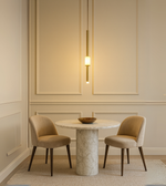 Linea brushed gold pendant light with slim vertical design.