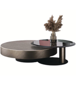 Pair of round dual coffee tables from Daya Worldwide, featuring sleek wooden surfaces and modern design.