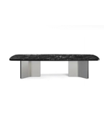 Modern Arcus dining table by Daya Worldwide featuring a sleek wooden surface and sturdy metal legs.