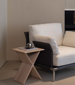 Daya Worldwide Axis X side table with a sleek, modern design featuring a metal frame and a wooden top surface.