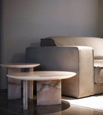 Round marble coffee table set with white marble tops and sleek metal legs, modern and stylish for living room decor.