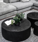 Round log coffee table by Daya Worldwide with a natural wood finish and sturdy design, ideal for living room decor.