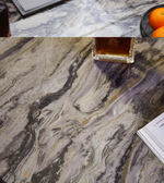 Marble coffee table with black Noir finish from Daya Worldwide, showcasing a sleek, modern design for contemporary living spaces.