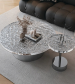 Hammered surface coffee and side tables from Daya Worldwide, featuring sleek, modern design in a durable metal finish.