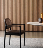 YOKO Dining Little Armchair by Daya Worldwide featuring a modern design with wooden legs and a cushioned seat.