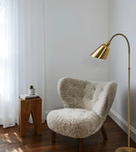 Luxurious shearling accent armchair by Daya Worldwide featuring plush upholstery and modern design for stylish comfort.