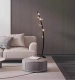 Contemporary floor standing lamp with glowing glass orbs in modern home décor