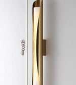 Gold wall-mounted light fixture on a white background with text indicating height.