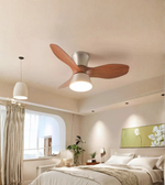 Ceiling fan in a bedroom with neutral decor