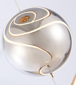 Modern pendant light fixture with a white and gold design on a white background