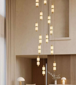 Modern chandelier with multiple lights hanging from the ceiling.