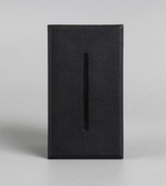 Black rectangular block with a central cutout on a light gray background