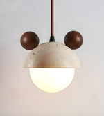 Pendant light with concrete shade and brown accents on a plain background
