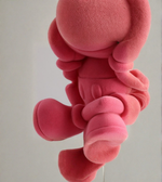 Close-up detail of pink textured cartoon mouse lamp body