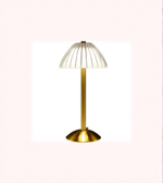 Minimal gold bedside table lamp on white surface