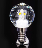 Crystal LED light bulb on a black background