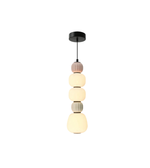 Modern pendant light with five cylindrical shades on a white background