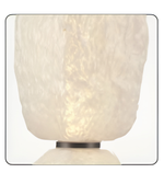 White textured table lamp on a white background
