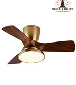 Ceiling fan with wooden blades and gold finish on a white background, featuring the Dubai Lights logo.