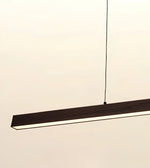 A modern linear LED pendant light with a dark wood-grain finish and a slim black suspension cord, shown against a plain off-white background.