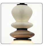 Modern pendant light with stacked cylindrical design on a white background