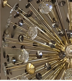 Close-up of a gold and crystal chandelier
