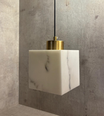 Modern marble effect pendant light by Daya Worldwide, featuring a sleek design with a marble-inspired finish and hanging pendant style.