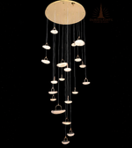 Modern chandelier with multiple pendant lights on a black background