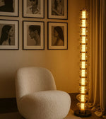 Elegant Daya Worldwide Lumina Tower floor lamp with sleek design and warm lighting for modern living spaces.