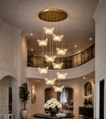 Luxury butterfly cascade chandelier hanging in double height foyer interior