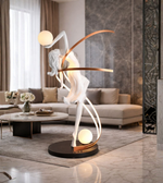 Illuminated dancer sculpture floor lamp by Daya Worldwide, featuring a graceful dancer statue with built-in lighting for stylish decor.