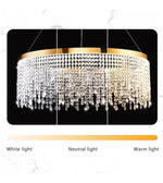 Modern crystal chandelier with gold frame, shown in white, neutral, and warm lighting options.