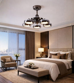 Designer LED ceiling fan with spotlight ring lights installed in a luxury bedroom interior