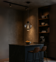 Daya Worldwide Eclipse Sphere pendant light hanging from ceiling, modern spherical design for contemporary interior decor.