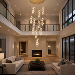 Luxury multi drop crystal pendant chandelier installed in a double height living area