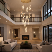 Luxury multi drop crystal pendant chandelier installed in a double height living area