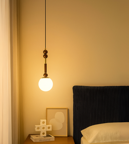 Daya Worldwide LUMA Sphere Pendant light hanging with a sleek, modern design in a contemporary interior setting.
