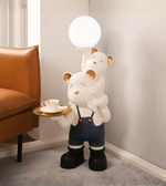 Playful bear duo sculpture by Daya Worldwide, decorative statues featuring two whimsical bear figures for home decor.