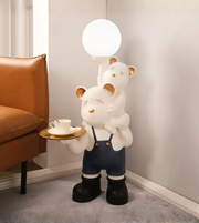 Playful bear duo sculpture by Daya Worldwide, decorative statues featuring two whimsical bear figures for home decor.