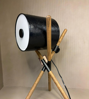 modern tripod spotlight table lamp with black cylindrical shade and wooden crossed legs, decorative bedside lighting
