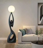 Modern feminine sculpture floor lamp by Daya Worldwide featuring a sleek, artistic statue design for stylish home decor.
