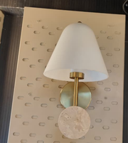 Modern bronze stone wall sconce by Daya Worldwide, featuring a sleek design and textured bronze finish for stylish lighting.