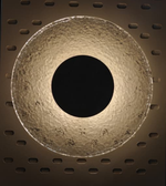 Modern stone halo wall light by Daya Worldwide, featuring a sleek circular design and warm illumination on a neutral wall.