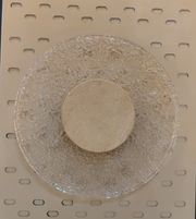 Modern stone halo wall light by Daya Worldwide featuring a circular design with a stone finish, ideal for contemporary wall decor.