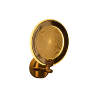Polished gold circular wall sconce with infinity spiral illumination isolated on background