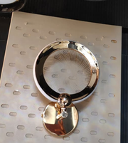 Golden infinity halo wall light by Daya Worldwide, featuring a circular LED design with a warm glow for modern decor.